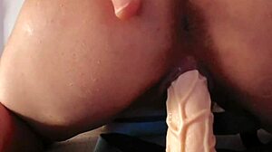 Woman Playing with Strapon Toy in Detailed Intimate Scene