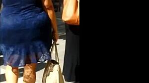 old slut in blue dress chats casually