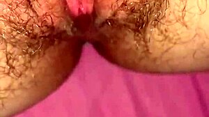 German wife masturbates her hairy pussy at home