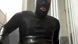 latex guy wanks in suggestive gay scene.