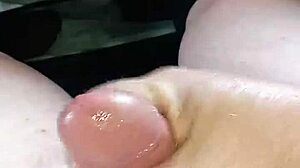 Horny Amateur in Homemade Setting Gives Intense Handjob and Cums on Herself