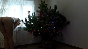 Petite girl dancing around the christmas tree. 🎄💃