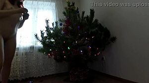 Petite girl dancing around the christmas tree. 🎄💃