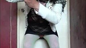 Bisexual sissy crossdresser teases with homemade swallow action