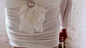 office worker in female outfit masturbates in corridor