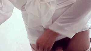 office worker in female outfit masturbates in corridor