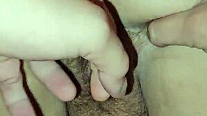 exploring her body bent over in a private moment