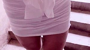 office worker in female outfit masturbates in corridor