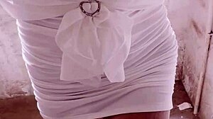 office worker in female outfit masturbates in corridor