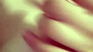 Girl masturbates showing tits and pussy