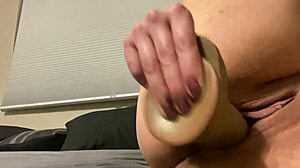 Hotwifeloves2fuck relaxes with her favorite dildo toy.
