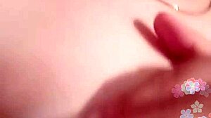 Girl masturbates showing tits and pussy