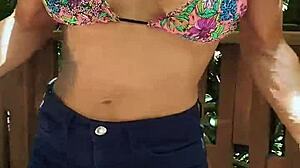 flexible babe stretches and plays in wild jungle forest fetish scene with daring moves.