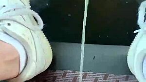 Watch her piss on the car seat outdoors!