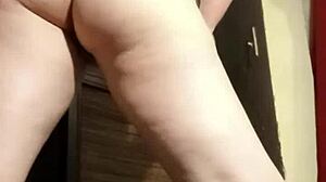 busty camgirl in grey teases with ass play