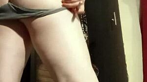 busty camgirl in grey teases with ass play