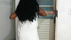 A cute ebony teen drops her towel in front of her neighbor, exposing her shaved body and making him hard.