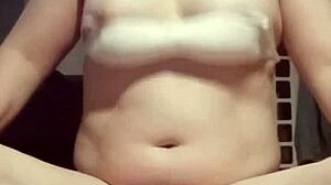 petite amateur with big natural tits plays with breasts