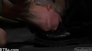 In the garage, the girl gets punished