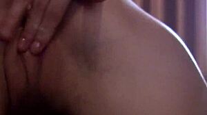 Petite brunette fingering herself so pleasurably!