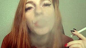 redhead smoking a cigarette in quiet moment