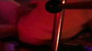 Femdom performs hard fisting on submissive partner