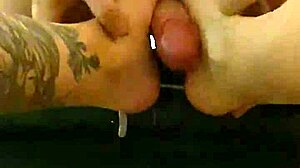 redhead licks fingers during footjob fetish