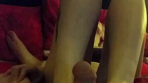 Amateur girlfriend surprises with footjob in video