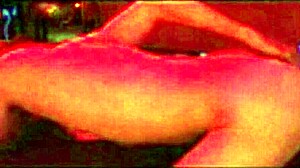 Femdom performs hard fisting on submissive partner