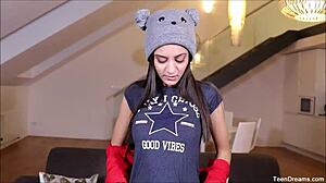 Shrima Malati, sexy and alluring, plays with her black dildo in this erotic scene.