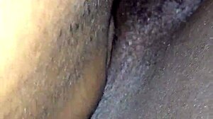 ebony beauty shines with wet allure.