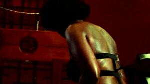 sexy mean domme spanks her sub in the pillory