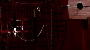 sexy mean domme spanks her sub in the pillory