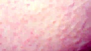 Feeling the intense stretch during fisting session