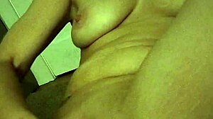 spun out slut feels horny and moans while fucking herself with a big dildo