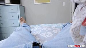 Stepmom catches stepson jerking and offers a surprising blow.