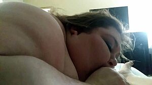 In the hotel, the SSBBW performs a blowjob on her partner.