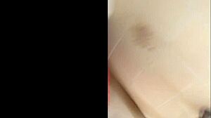 Latina Enjoys Private Time In The Bathroom