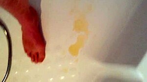 Pissing in panties while stroking cock