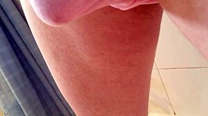 Pissing in panties while stroking cock