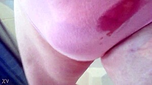 Pissing in panties while stroking cock