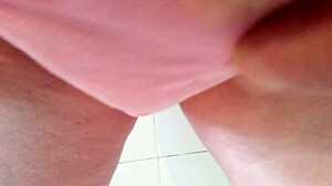 Pissing in panties while stroking cock