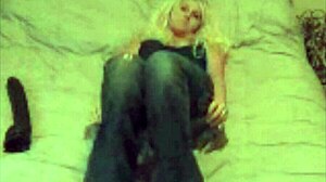 Blond milf fucks big black dildo