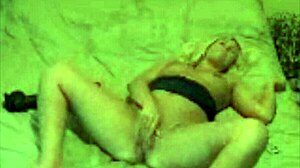 Blond milf fucks big black dildo