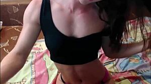 Muscular bodybuilder shows off on webcam