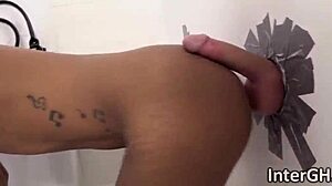 sexy ebony sucks white cock at glory hole