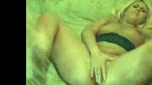 Blond milf fucks big black dildo