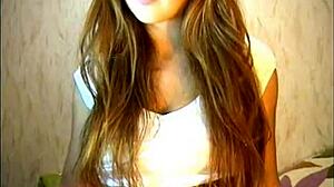 Young brunette engages in fun webcam chat with friends