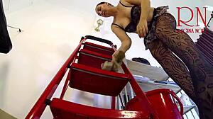 the brunette cleaner maid tidies up naked in the office, showing her big pussy and natural tits