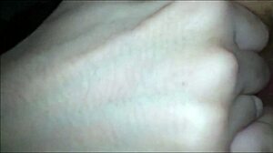 A sexy woman indulges in self-pleasure with fingering and blowjob fantasies